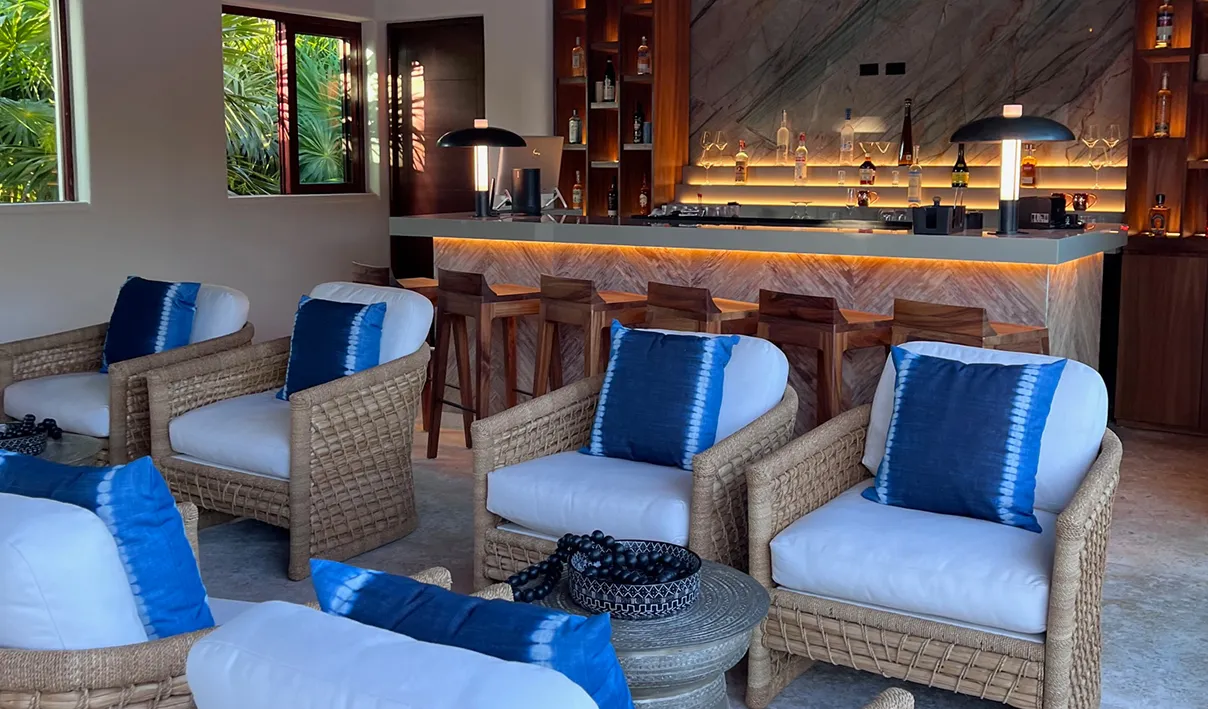 A living room filled with furniture and a bar, a digital rendering by Ralph Burke Tyree, featured on pexels, photorealism, rendered in unreal engine, reimagined by industrial light and magic, playstation 5 screenshot